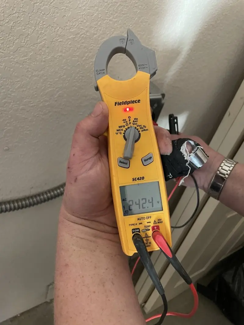 Voltage testing with clamp meter during Generator Installation in Sheridan